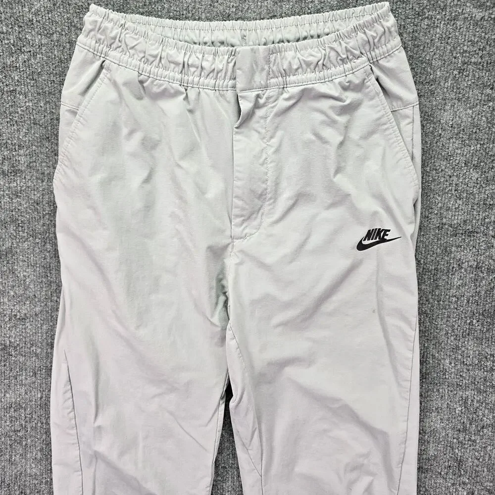 Nike Sportwear Woven Commuter Pants Mens Small Gray Tech Tapered Drawstring